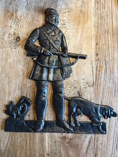 Eisenguss Jäger mit Hund